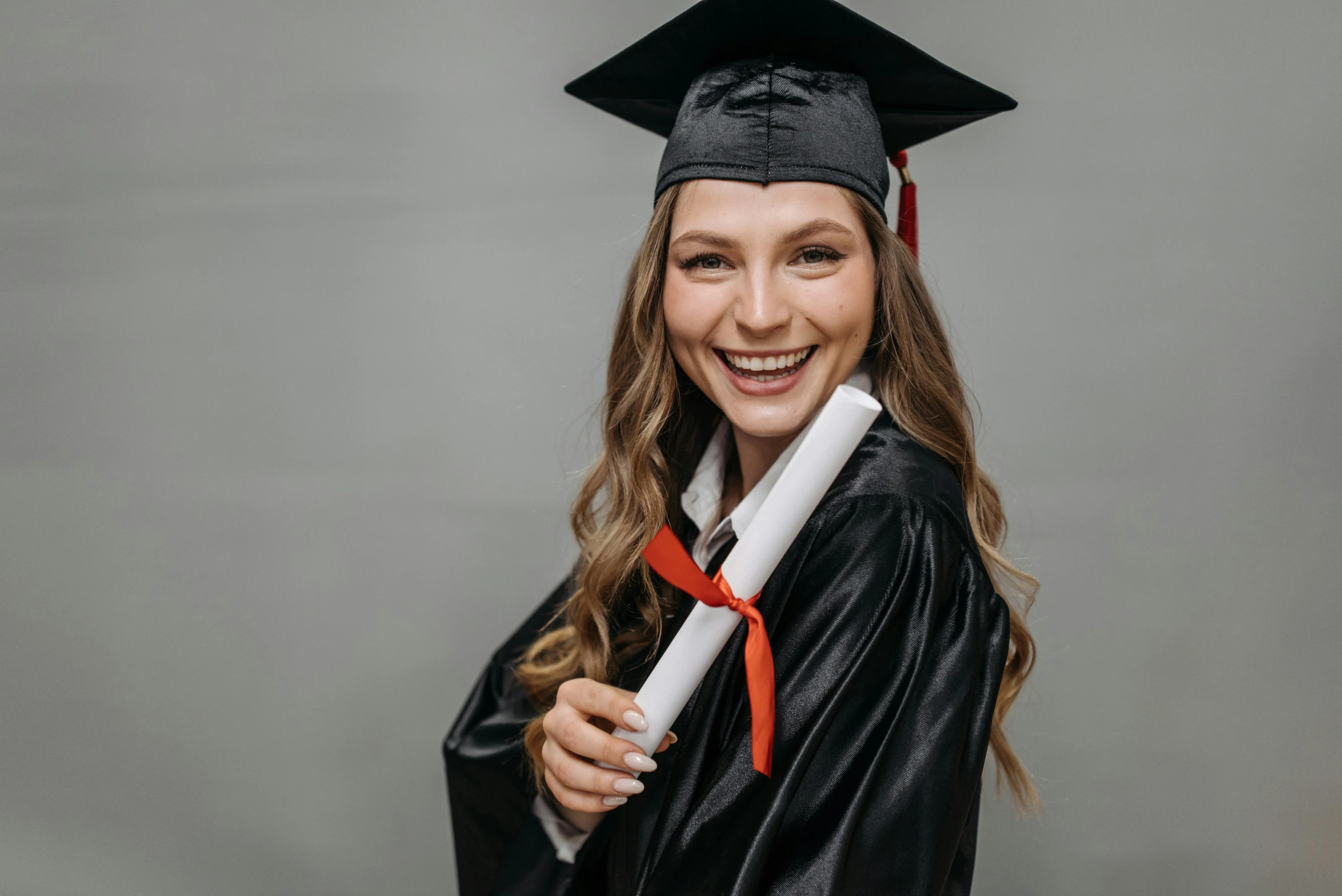 a woman in a graduation gown holding a diploma, 🤬 🤮 💕 🎀, smiling young woman, fancy dress, leather robes