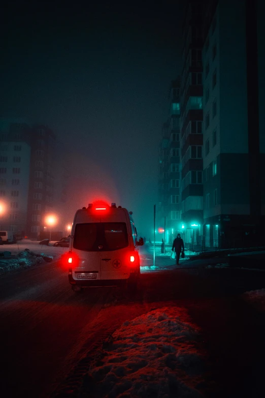 a car driving down a street at night, by Adam Marczyński, pexels contest winner, realism, ambulance, cold environment, red and cyan, city fog