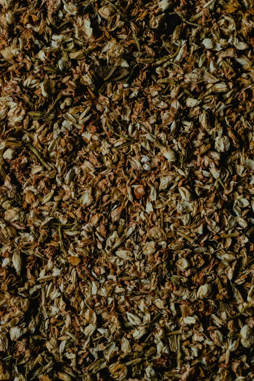 a pile of mulch sitting on top of a table, trending on unsplash, renaissance, thumbnail, full frame image, wild ginger hair, seeds