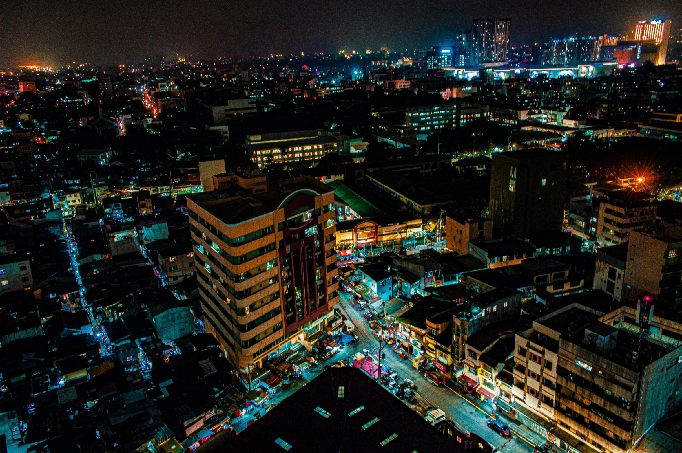 an aerial view of a city at night, pexels contest winner, philippines, looking left, documentary photo, low detailed