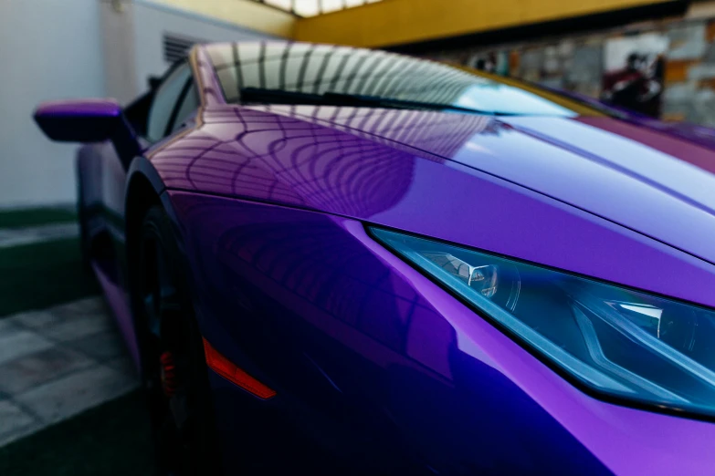 a purple sports car parked in front of a building, pexels contest winner, hyperrealism, random metallic colors, closeup 4k, pearlescent skin, fan favorite