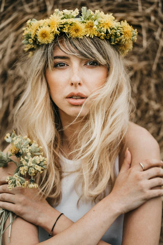 a woman with a flower crown on her head, inspired by Elsa Bleda, trending on pexels, renaissance, medium yellow blond hair, disheveled, natural skin, sydney sweeney