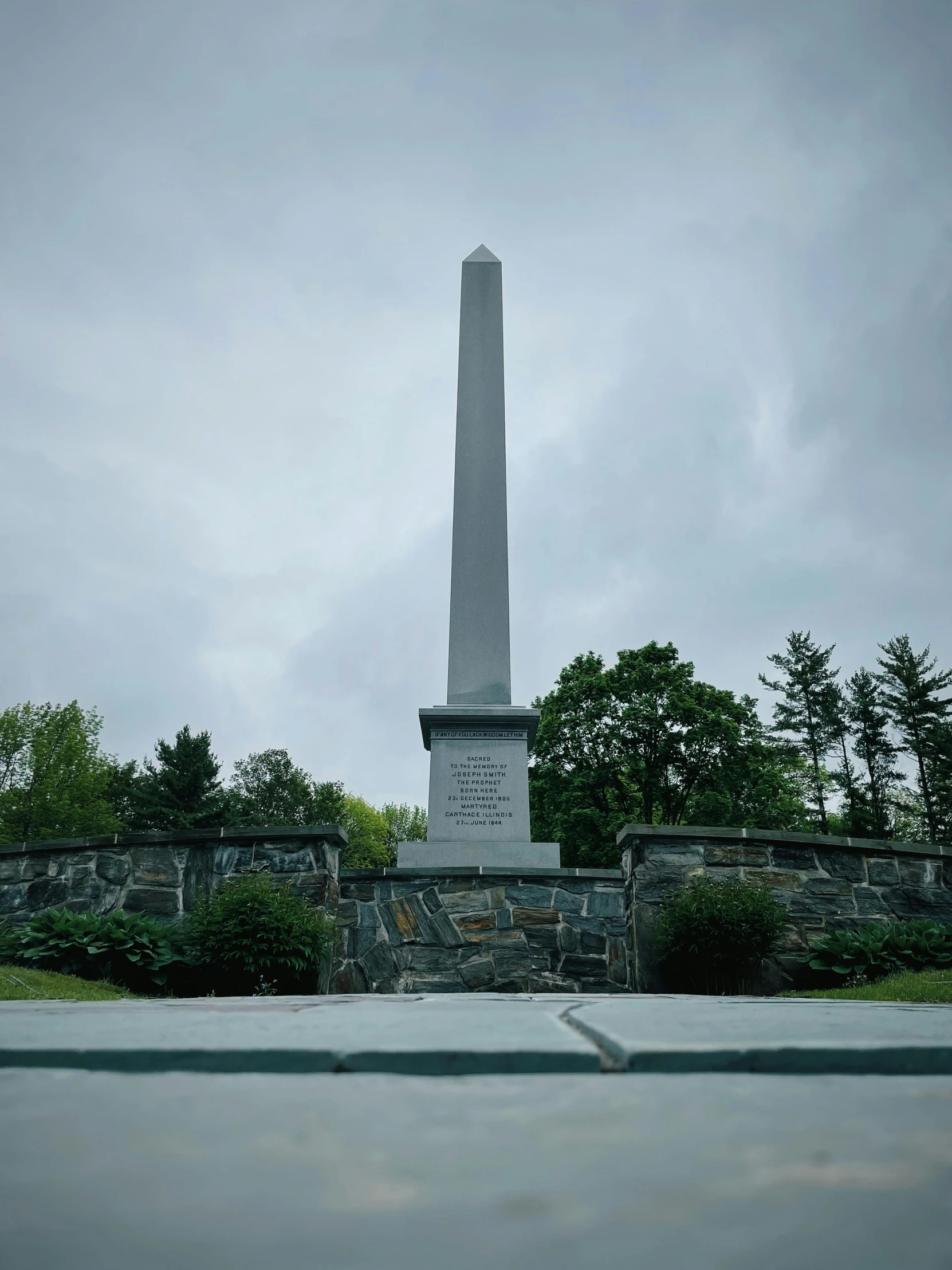 a monument sitting in the middle of a park, new hampshire, listing image, picture taken from the ground, slate