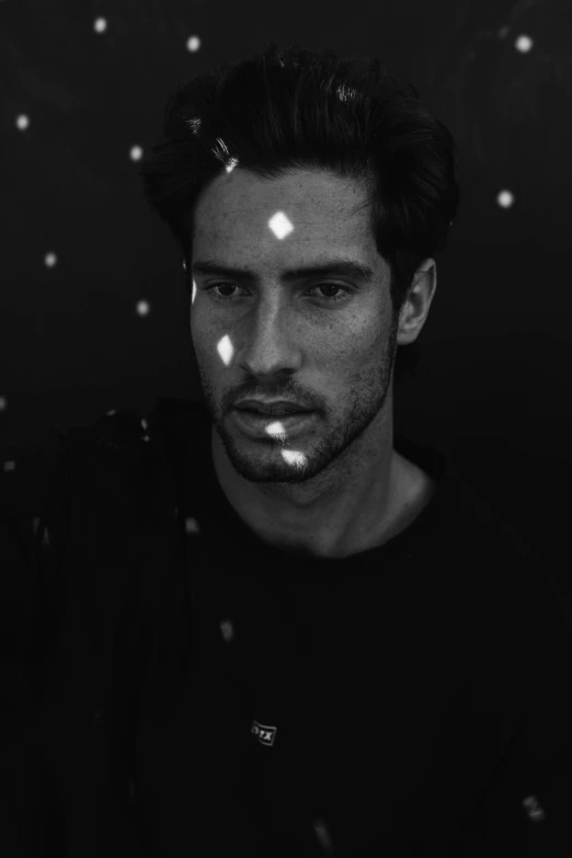 a black and white photo of a man, by Alexis Grimou, glowing, daniel ricciardo, digital still, like a catalog photograph