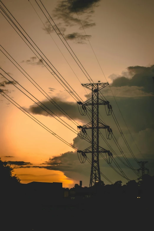 a sunset with power lines in the foreground, pexels contest winner, renaissance, towering, stacked image, uploaded, afternoon lights