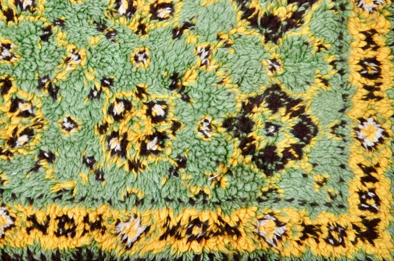 a close up of a green and yellow rug, inspired by Alberto Morrocco, arabesque, highly detailed-h 704, fuzzy details, 2 0 th century, medium detail