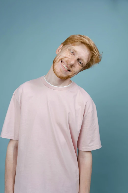a man in a pink shirt posing for a picture, an album cover, featured on reddit, hyperrealism, ginger hair, smileing nright, transparent background, promotional image