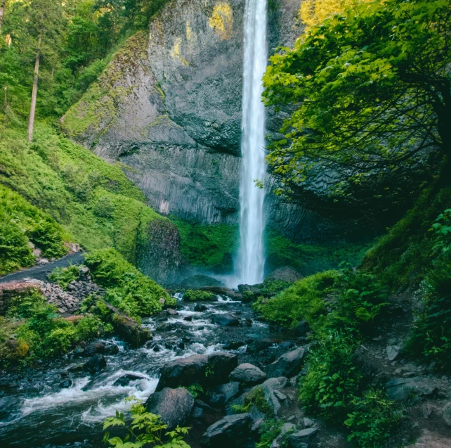 a waterfall in the middle of a lush green forest, inspired by Elsa Bleda, pexels contest winner, climbing mountain in washington, festivals, sandfalls, 2 5 6 x 2 5 6 pixels