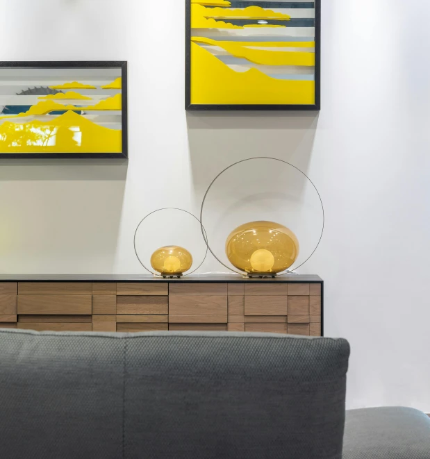 a living room filled with furniture and art, an abstract sculpture, inspired by Emilio Grau Sala, visual art, yellow aureole, 4 k detail, lamp ( ( ( fish tank ) ) ) ), hd artwork