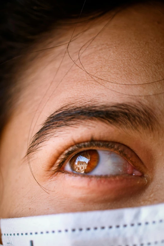 a close up of a person wearing a face mask, trending on unsplash, hyperrealism, beautiful brown eyes, high angle closeup portrait, eye scar, asian hyperdetailed