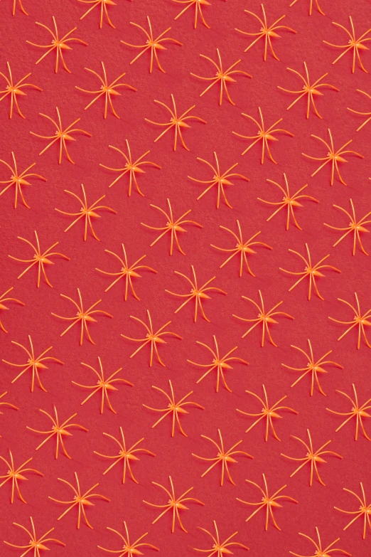 a red background with orange stars, inspired by François Barraud, tonal topstitching, drosera capensis, embossed, cotton