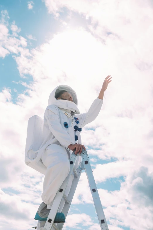 a woman in a space suit standing on a ladder, trending on unsplash, aestheticism, ☁🌪🌙👩🏾, his arms spread. ready to fly, sitting on top of a cryopod, uniform off - white sky