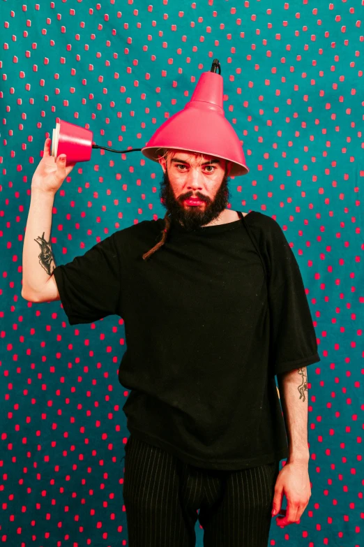 a man with a pink hat on top of his head, pexels contest winner, pop art, with a full black beard, awkwardly holding red solo cup, showstudio, bells