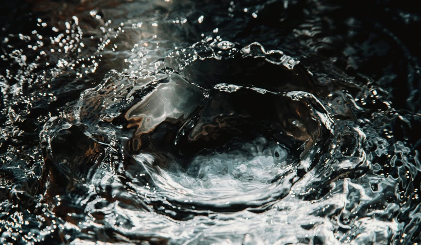 a close up of a bowl of water, inspired by Anish Kapoor, pexels contest winner, black, sewer, cinema 4d cinematic render, instagram post