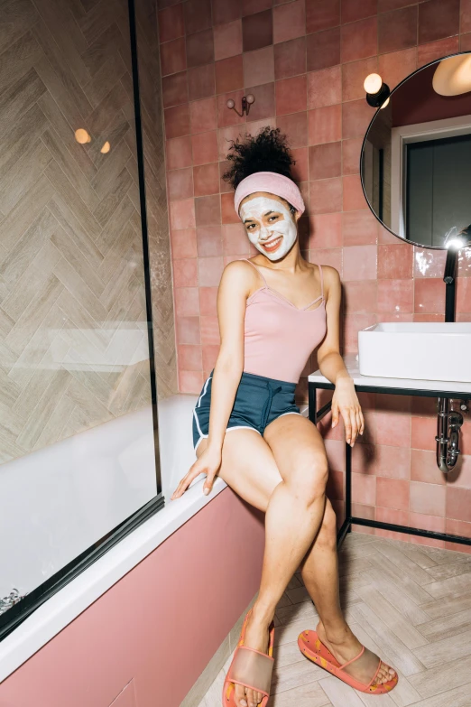 a woman sitting on a window sill in a bathroom, by Olivia Peguero, trending on pexels, renaissance, wearing a pink head band, charli xcx, pleasing face, being mixed