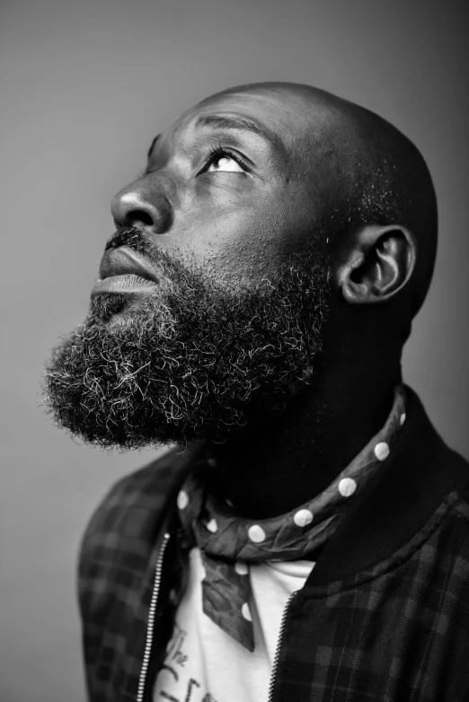 a black and white photo of a man with a beard, by Clifford Ross, unsplash, lance reddick, square, a woman, atiba jefferson