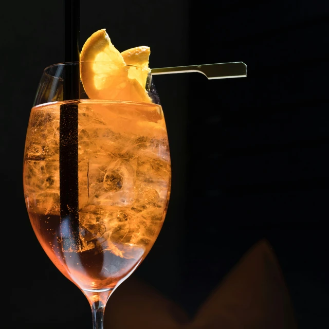 a close up of a drink in a glass with a straw, by Frederik Vermehren, pexels contest winner, renaissance, orange glow, paolo veronese style, thumbnail, bubbly