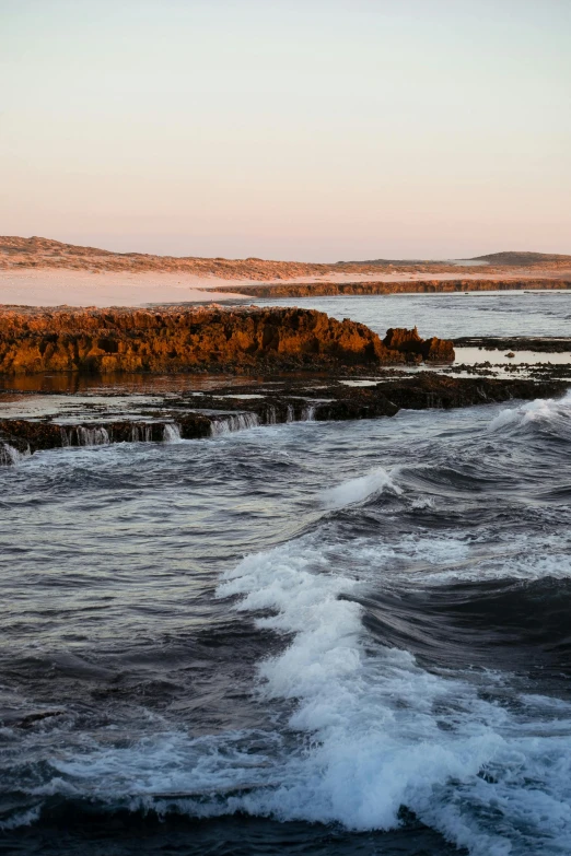 a man riding a surfboard on top of a wave, australian tonalism, geological strata, near a jetty, farming, break of dawn on neptun