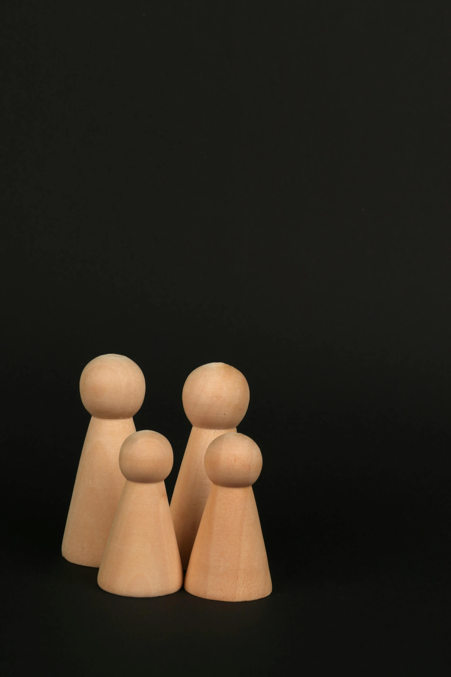 a couple of wooden figures standing next to each other, unsplash, on black background, 15081959 21121991 01012000 4k, super detail of each object, family photo