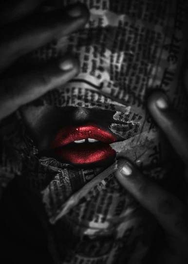 a close up of a person's hand holding a red lipstick, an album cover, pexels contest winner, art photography, scary and dark, newspaper photography, kiss, noir effect