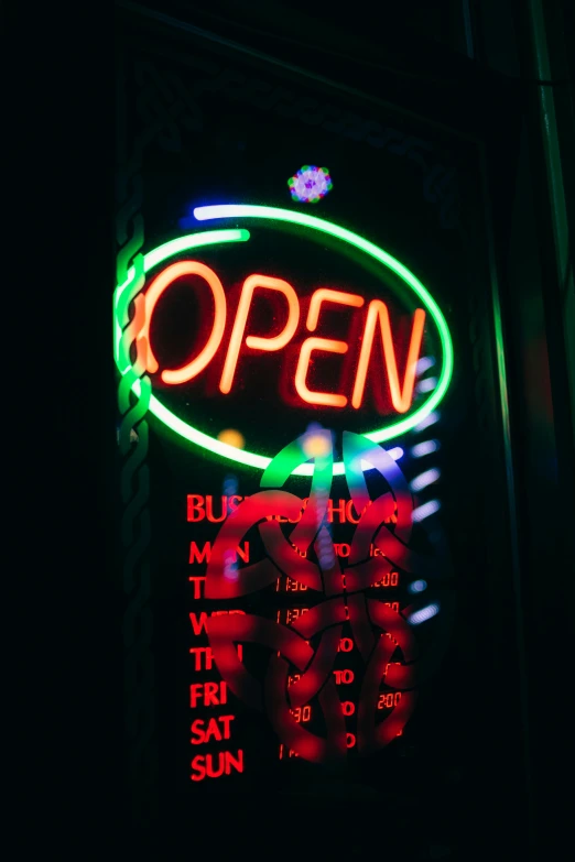 a neon sign hanging from the side of a building, profile image, open room, stores, local close up