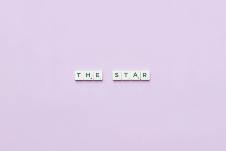 a purple background with the word the star spelled in scrabbles, an album cover, trending on unsplash, visual art, on a gray background, there are two sides to the story, 3 4 5 3 1, photo pinterest