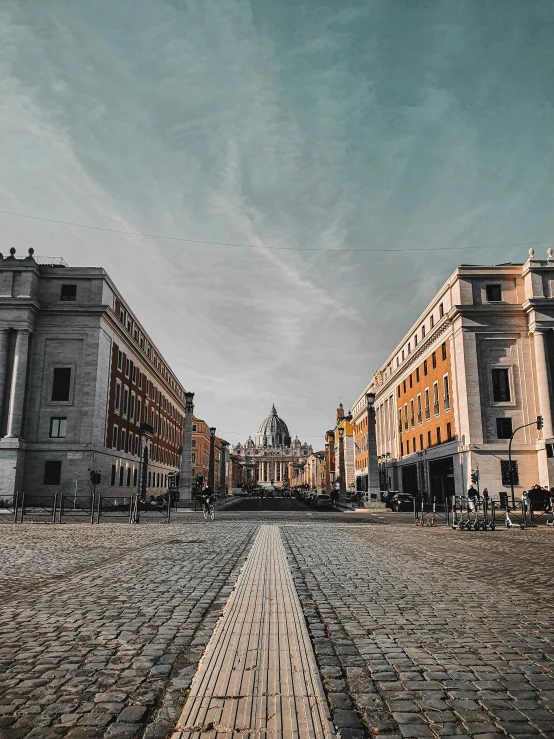 a cobblestone street in a european city, by Cagnaccio di San Pietro, pexels contest winner, neoclassicism, vatican in background, 🚿🗝📝, hyperrealism photo, background image