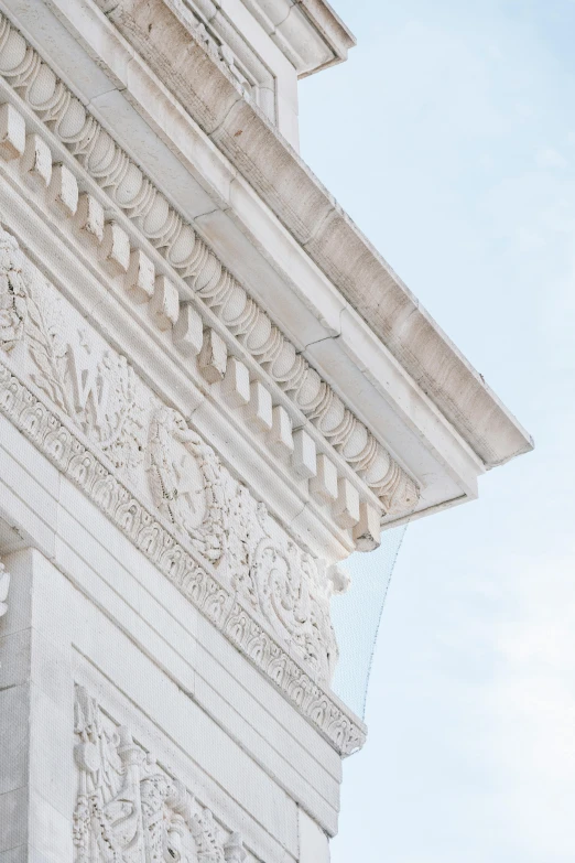 a clock that is on the side of a building, a marble sculpture, trending on unsplash, neoclassicism, white stone arches, intricate details photograph, half image, greek temple