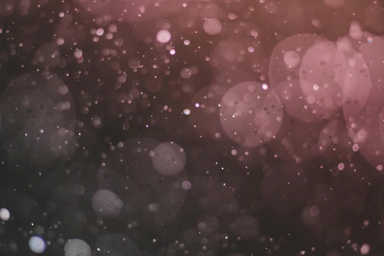 a blurry photo of a pink and black background, pexels, snow flurries, background image, condensation droplet render, extremely detailed + 8k