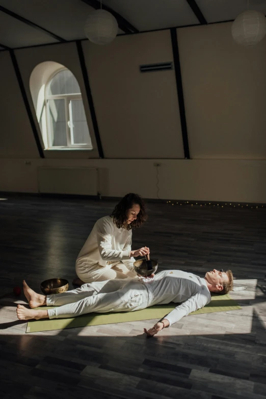 a man and a woman doing yoga together, by Julia Pishtar, pexels contest winner, renaissance, lying down, denis sarazhin, light room, deity)