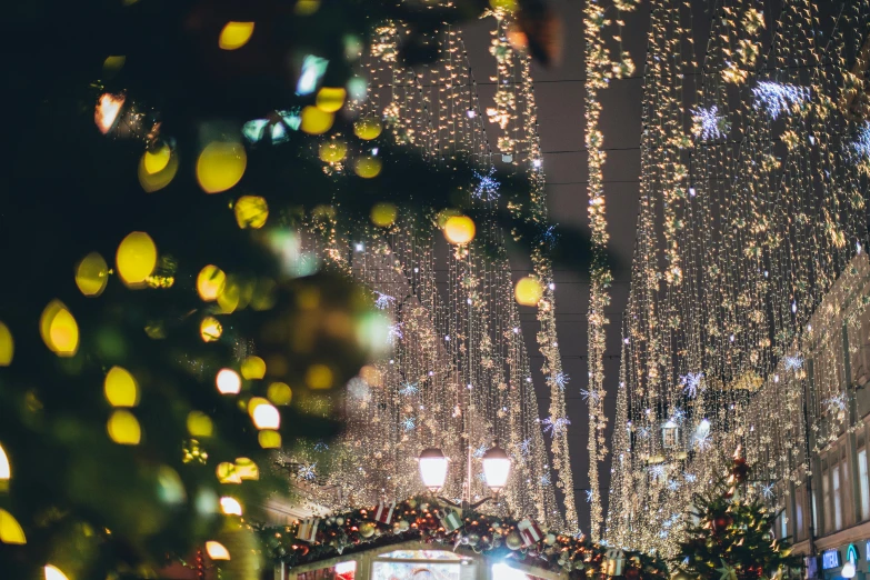 a street filled with lots of christmas lights, by Julia Pishtar, half image, fairy lights, seasonal, thumbnail