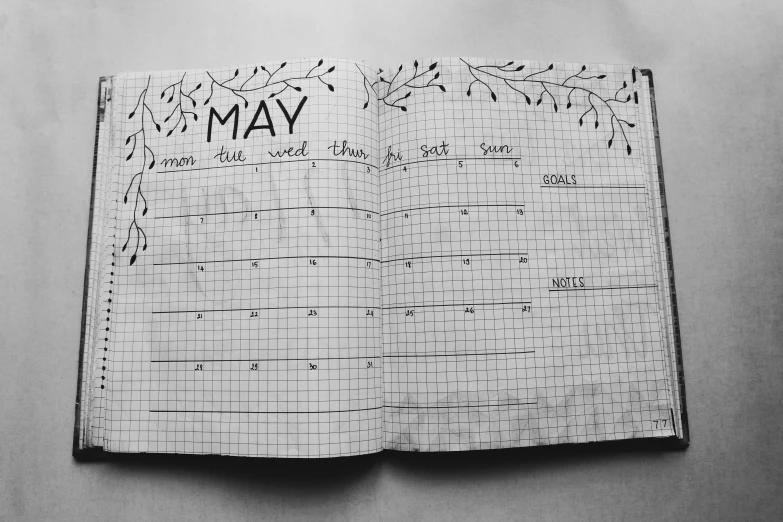 a black and white photo of a bullet journal, by Carey Morris, pixabay, spring theme, ffffound, grid layout, may 1 0
