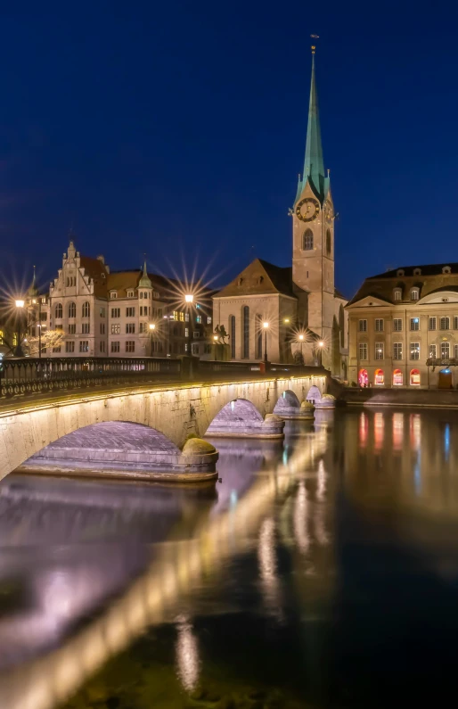 a bridge over a river with a clock tower in the background, by Karl Stauffer-Bern, serene lighting, panoramic, nuremberg, lead - covered spire