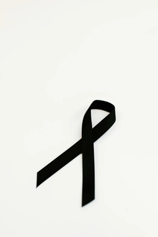a black ribbon on a white background, unsplash, disease, instagram picture, 9 / 1 1, 15081959 21121991 01012000 4k