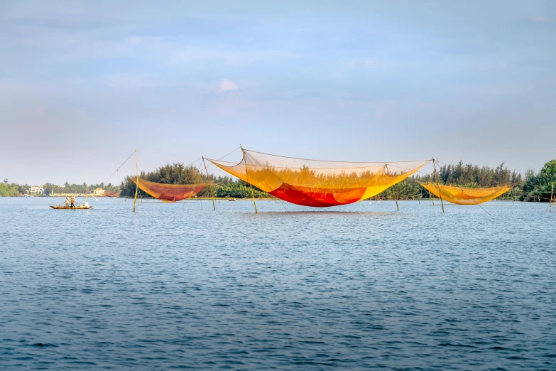 a group of hammocks sitting on top of a body of water, gutai group, do hoang tuong artwork, lpoty, panoramic shot, nets