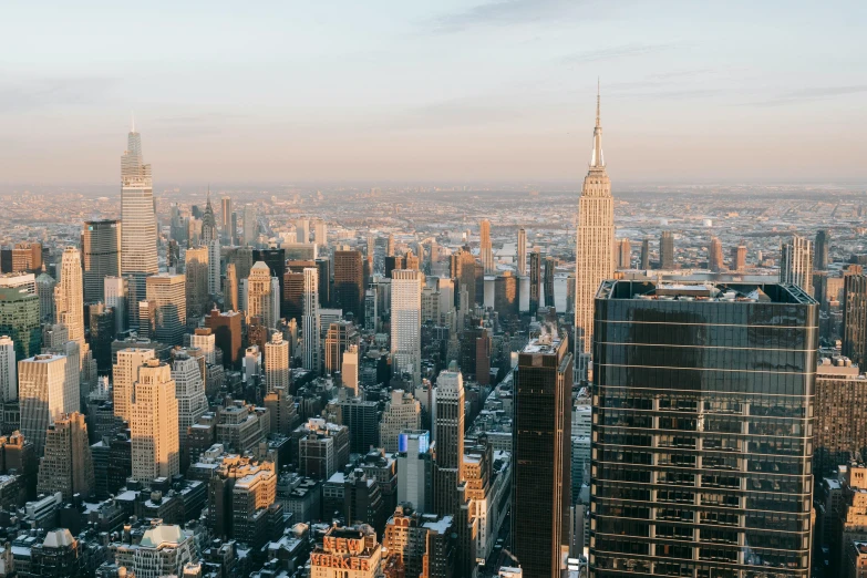 a view of a city from the top of a building, pexels contest winner, new york background, background image, thumbnail, high resolution image