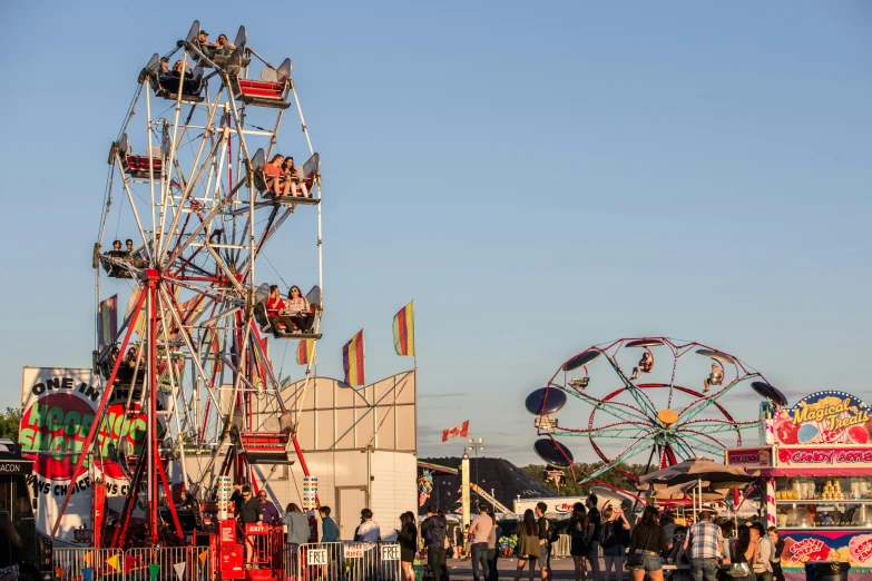a carnival filled with lots of people next to a ferris wheel, yeg, profile image, fan favorite, caulfield