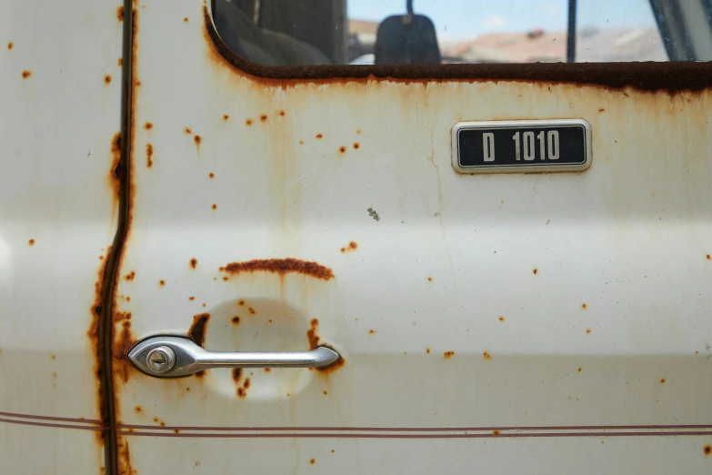 a rusted white truck with a number plate on it, unsplash, auto-destructive art, a door you must never open, microbus, random detail, taken in the late 2010s