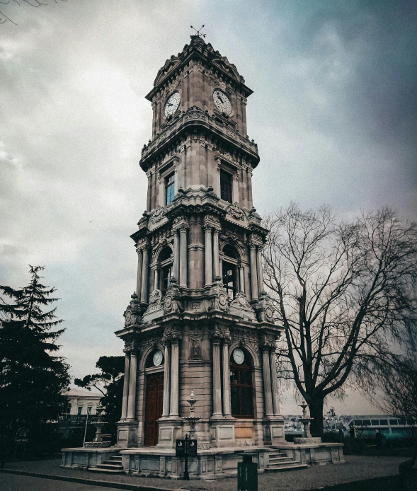 a tall clock tower sitting in the middle of a park, pexels contest winner, art nouveau, turkey, dramatic and moody, exterior view, today\'s featured photograph 4k