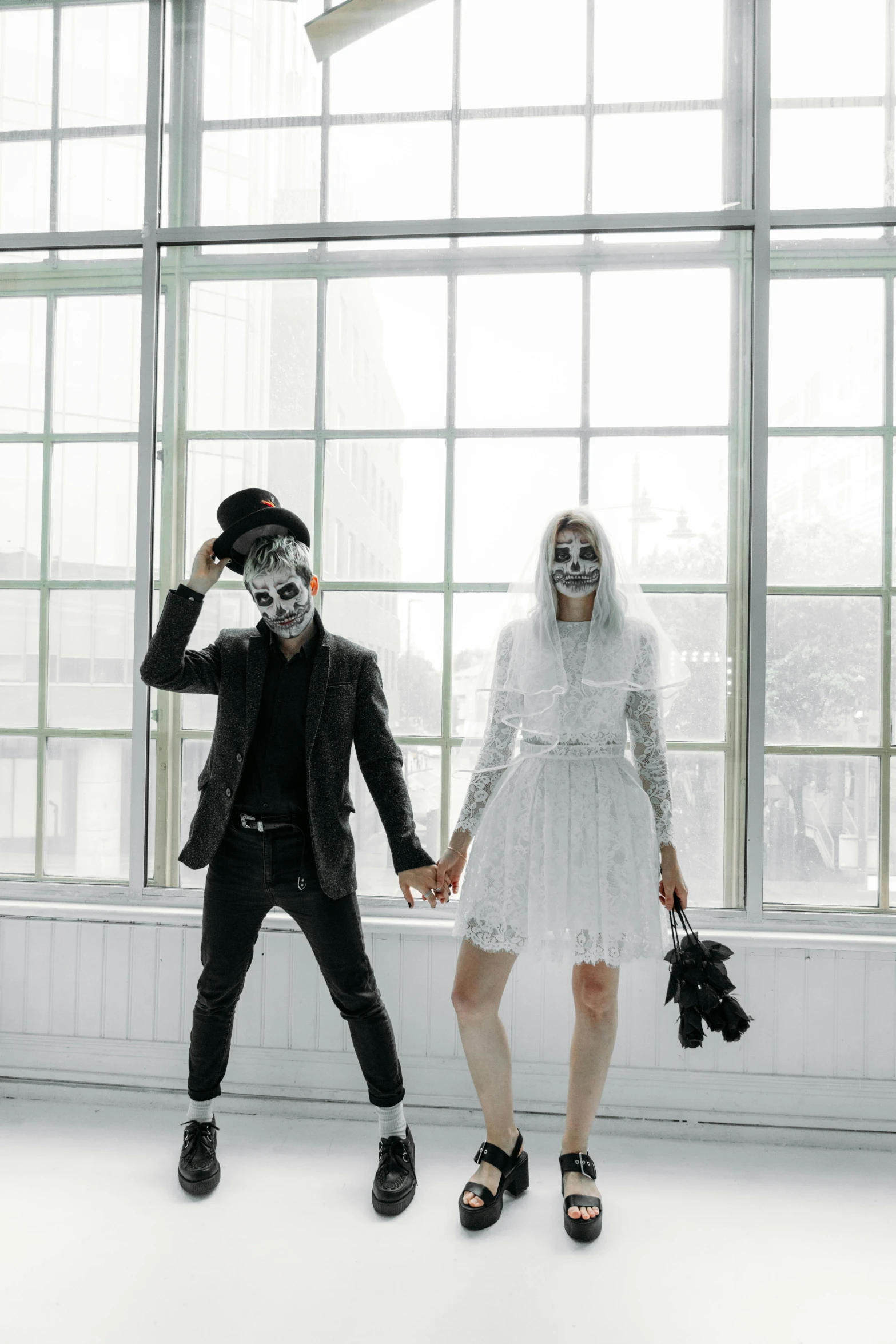 a couple of people that are standing in front of a window, pexels contest winner, international gothic, ska skeleton and girlfriend, in white room, wearing mask, ulzzang