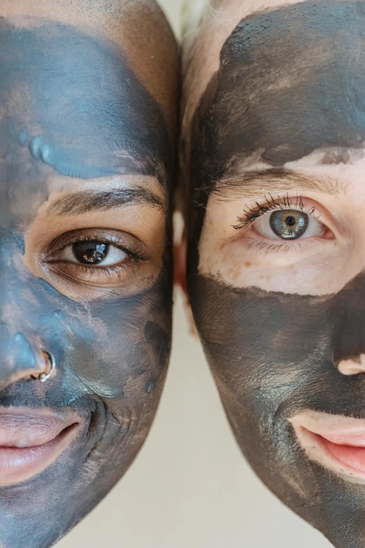 two people with facial masks on their faces, by Arabella Rankin, trending on pexels, real human face with skin, full of black goo, boy with neutral face, blue-black