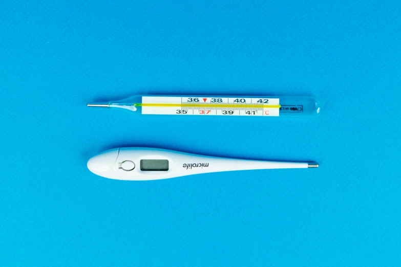 a thermometer and a thermometer on a blue background, happening, superpop ultrabright, set against a white background, sterile, thumbnail