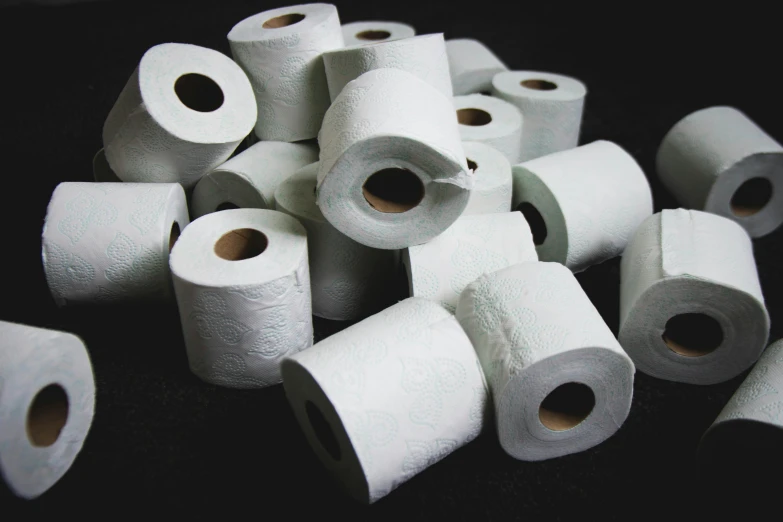 a pile of toilet paper sitting on top of a table, 4 2 0, green pupills, analogue, steroid use