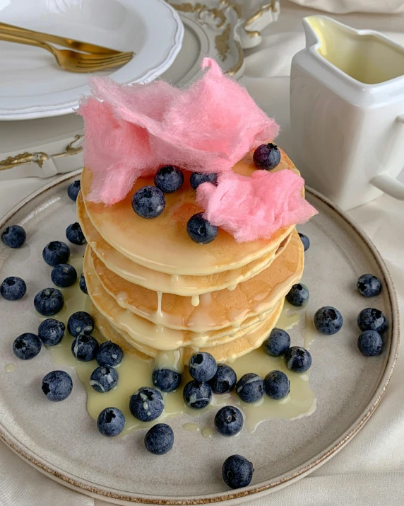 a stack of pancakes with blueberries on a plate, pexels contest winner, renaissance, made of cotton candy, taken on iphone 14 pro, lush flora, porcelain organic tissue