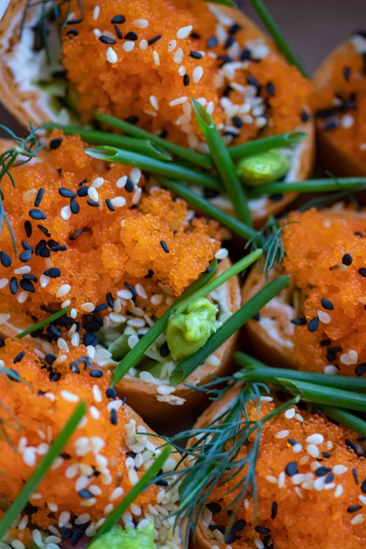 a plate that has some kind of appetizer on it, unsplash, mingei, orange fluffy spines, close - up photo, thumbnail