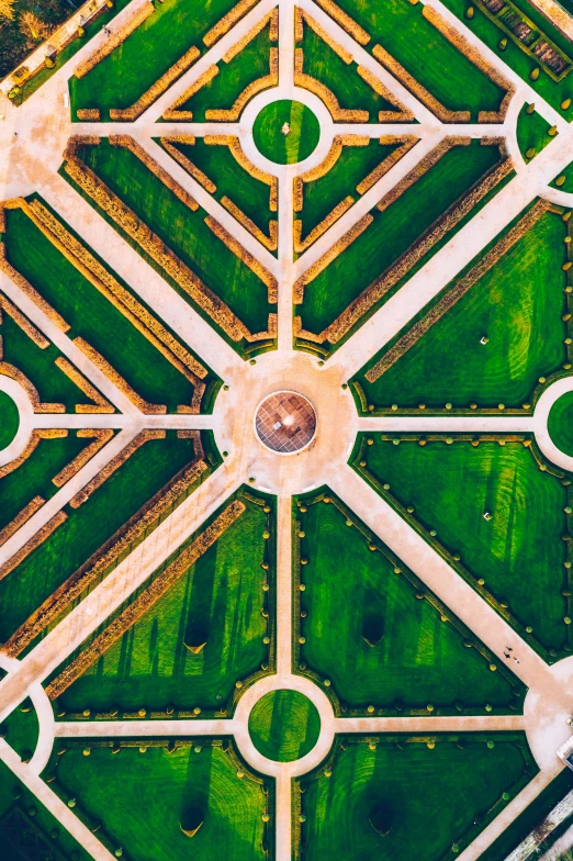 a bird's eye view of a green park, an album cover, pexels contest winner, geometry and astrology, versailles, centered shot, square lines