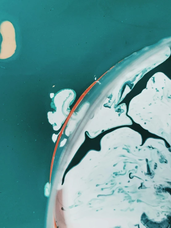 a close up of a shark with it's mouth open, inspired by Lucio Fontana, trending on unsplash, lyrical abstraction, teal orange, liquid marble fluid painting, toothpaste refinery, embedded in clear epoxy