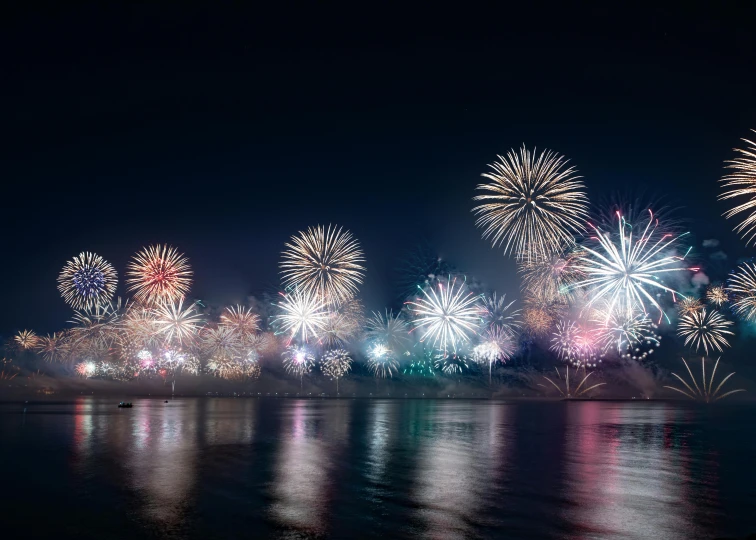 fireworks light up the night sky over a body of water, pexels contest winner, hurufiyya, grey, multiple colors, 5 0 0 px, thumbnail