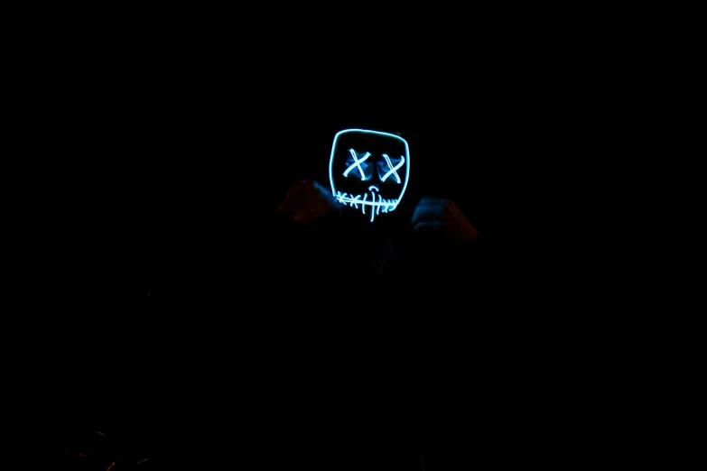 a person wearing a neon mask in the dark, an album cover, unsplash, stick figure, blue leds, ((skull)), neon cross