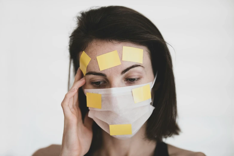 a woman with sticky notes on her face, trending on pexels, square sticker, medical image, yellow, tape